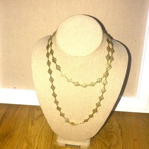 Stella & Dot antique gold toned long necklace.